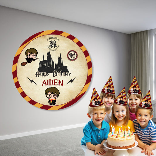 Harry Potter theme customized circular birthday backdrop displayed behind a cake table with Hogwarts design and personalized name and age with burgundy gold balloon garland birthday party India