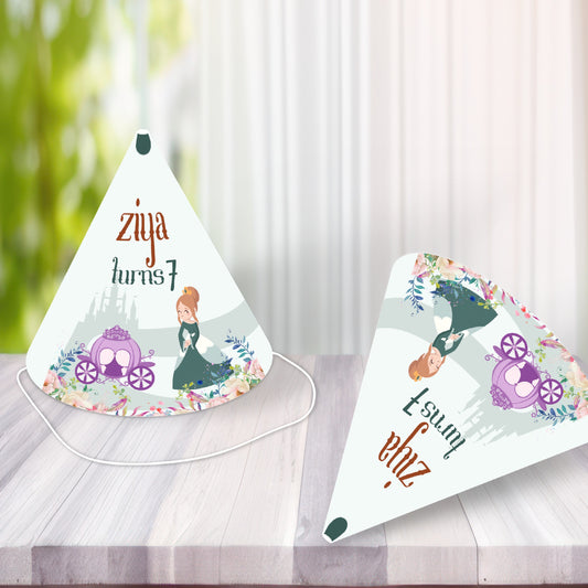 Princess theme customized birthday hats with personalized name and bespoke glitter crown design displayed at a girls birthday party celebration with coordinated pink gold balloon decoration India
