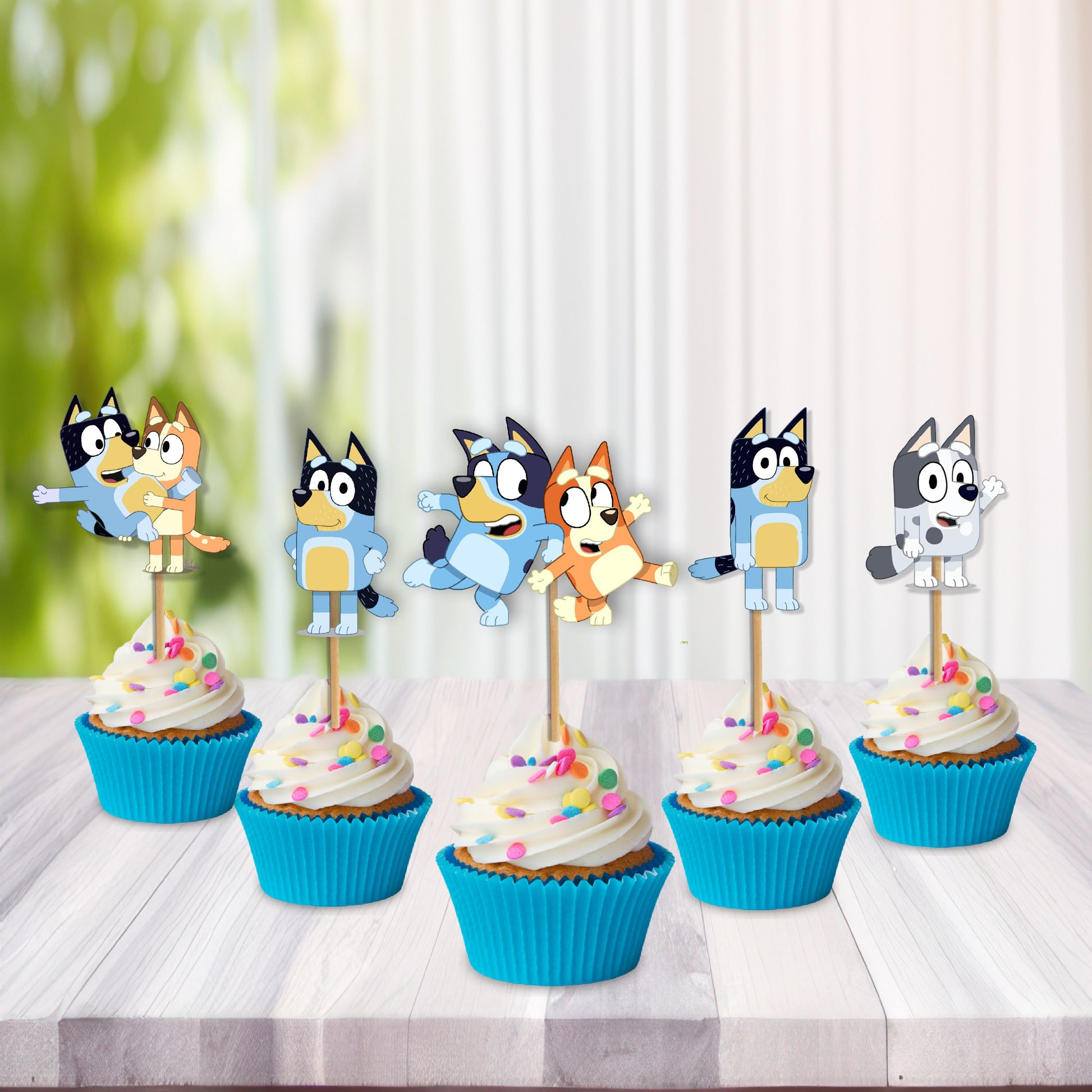 Bluey and Bingo themed birthday cupcake toppers displayed on a kids birthday party dessert table, 300GSM character cake decoration – BluParty India