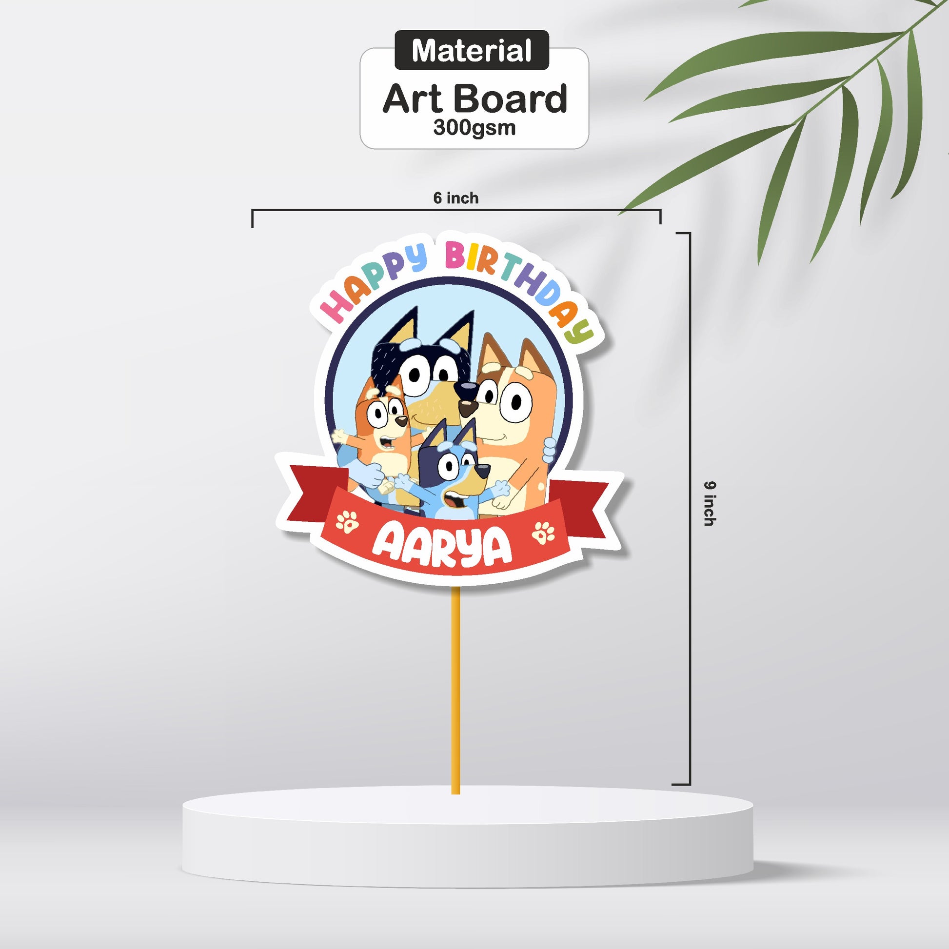 Close-up of personalised Bluey birthday cake topper showing custom child's name and age with Bluey and Bingo characters, premium cardstock cake decoration – BluParty India