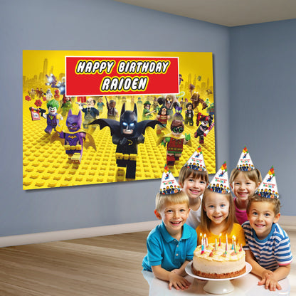 Close-up of BluParty Lego DC super heroes backdrop design showing Batman and Superman in Lego minifigure brick art style with vibrant superhero colour palette
