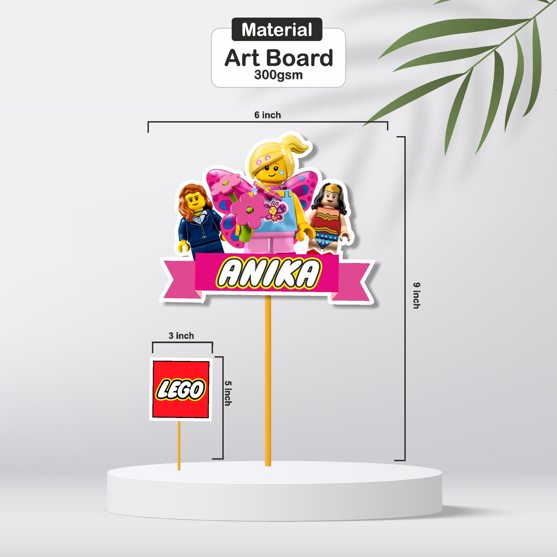 Close-up of a vibrant classic Lego brick cake topper showing colourful red yellow blue and green building block design with Happy Birthday message on 300GSM artboard
