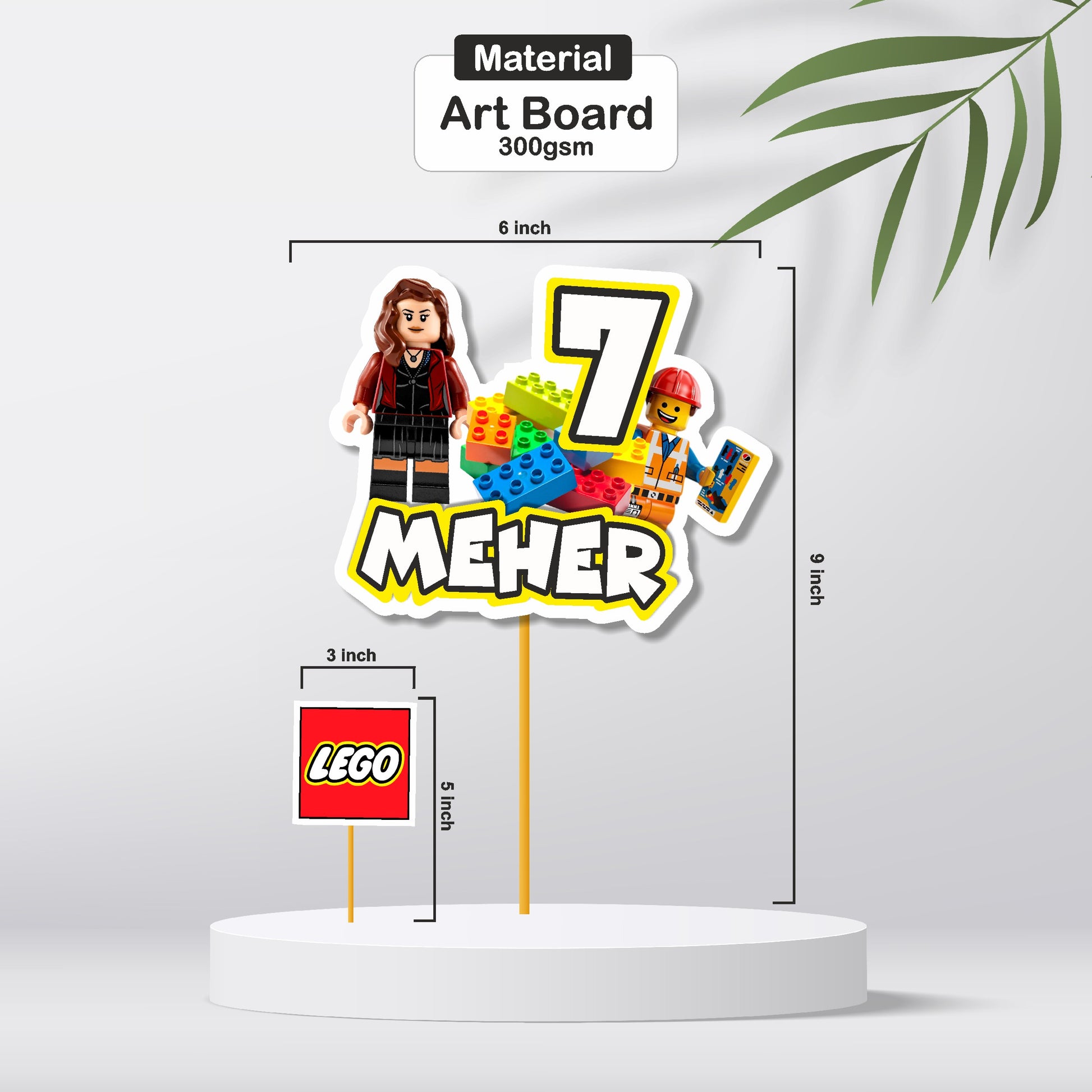 Close-up of a colourful Lego brick cake topper made from premium 300GSM artboard with custom name and birthday number
