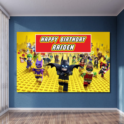 Lego DC super heroes birthday backdrop installed at kids party showing Batman Superman Flash Wonder Woman in Lego minifigure art style with child's name and age personalized by BluParty India