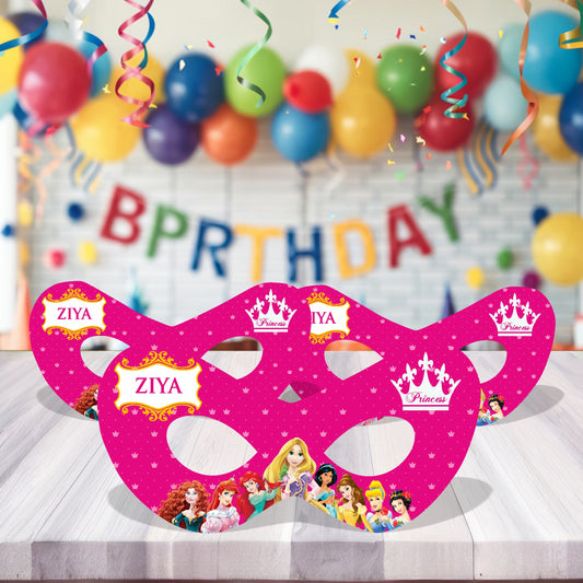 Princess theme personalized birthday eye masks with royal masquerade design and child's name displayed at a girls birthday party celebration with pink gold balloon decoration India